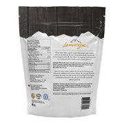 Back of Lamontagne Milk Chocolate Pistachios 500 g bag with ingredients and nutrition facts